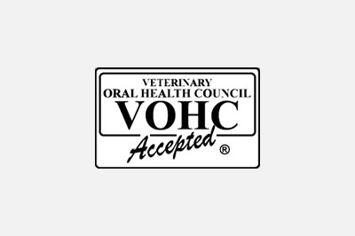 Logo of the Veterinary Oral Health Council (VOHC), featuring the acronym "VOHC" in large letters with the text "Veterinarian Oral Health Council" and "accepted" around it, all within a rectangular border.