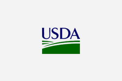 Logo of the United States Department of Agriculture (USDA), featuring the acronym "USDA" in dark blue letters above a stylized green field and white horizon line, symbolizing their collaboration with veterinarians.