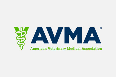 Logo of the American Veterinary Medical Association (AVMA) featuring bold blue letters "AVMA" and a green veterinary caduceus symbol on the left, representing veterinarians across the nation.